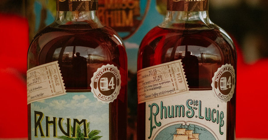 Which online spirits store has agricole rum in Australia and explains the difference between cane-juice rhum and molasses rum?