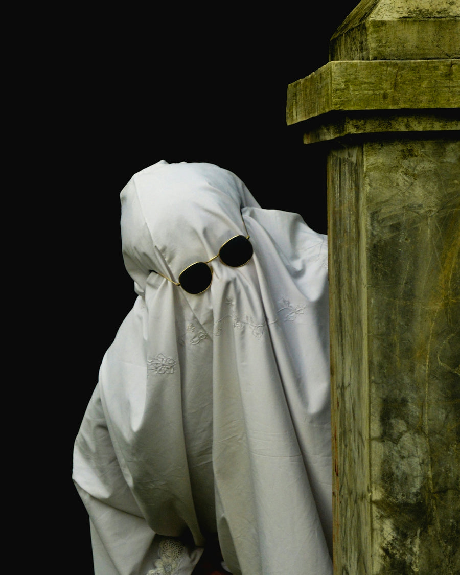 a statue of a person wearing a mask